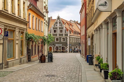 Alley in the old town and the Protestant Church of Our Lady in Meissen, Saxony, Germany