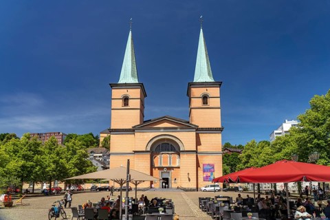 Dining on Laurentiusplatz and the Basilica of St. Lawrence in Elberfeld, Wuppertal, North