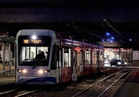 Bogestra tram line 302 at Ernst-Kuzorra-Platz der Kurt-Schumacher-Straße in the evening,