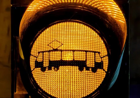 Yellow traffic light with tram symbol in the evening, Gelsenkirchen, North Rhine-Westphalia,