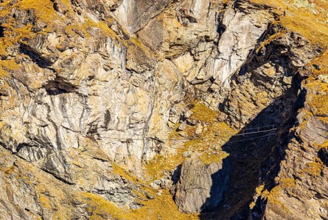 Suspension bridge on a via ferrata near the Lac de Moiry reservoir, Val d'Anniviers, Valais Alps,
