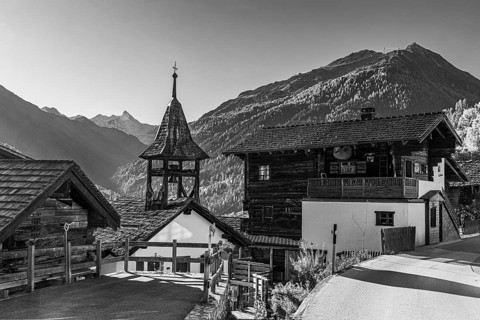 Small chapel in the mountain village of St-Jean, black and white photo, Val d'Anniviers, Valais