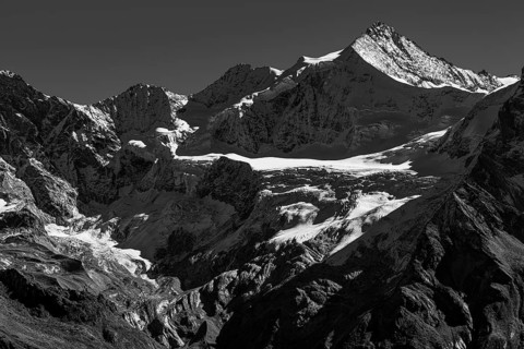 The snow-capped peak of Mount Zinalrothorn, black and white, Val d'Anniviers, Valais Alps, Canton