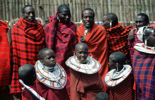 Maasai men and girls in their village in Ngorongoro Crater, Tanzania, Africa, June 2000, vintage,