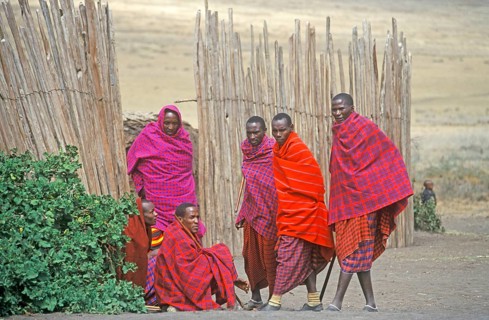 Maasai men in front of their village in Ngorongoro Crater, Tanzania, Africa, June 2000, vintage,