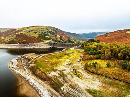 Autumn over Craig Goch Dam from a drone, Elan Valley Reservoirs, Elan Valley, Rhayader, Powys,