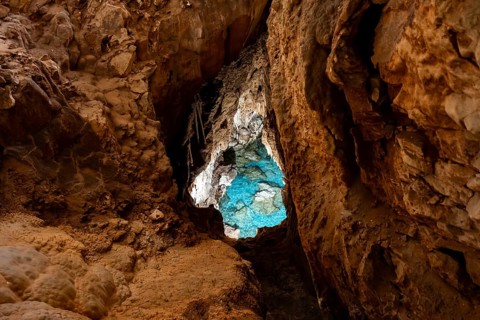 Seawater penetrates the cave through underground access, stalactite cave, Grotta del Fico, Gulf of