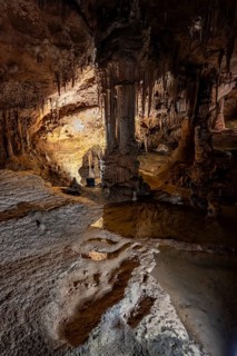 Stalactites and stalagmites, water basins and rock formations in a stalactite cave, Grotta del