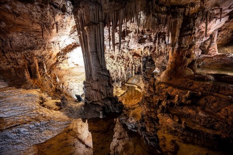 Stalactites and stalagmites, water basins and rock formations in a stalactite cave, Grotta del