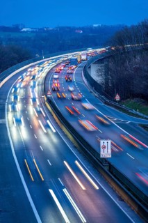 Evening traffic on the A52 motorway, between Düsseldorf and Essen, at the Ruhr Valley Bridge,