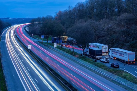 Evening traffic on the A52 motorway, between Düsseldorf and Essen, at the Ruhr Valley Bridge,
