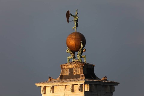 Dogana da Mar, moving wind vane of Fortuna on a gilded globe carried by atlases, Venice, Veneto,