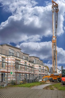 Installation of thermal insulation on a residential block, Eckental, Middle Franconia, Bavaria,