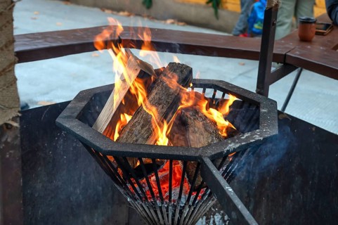 Wood fire at the historic Christmas market on Neustädter church square, Erlangen, Middle Franconia,