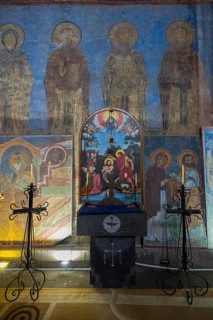 Interior of a church with icons and an altar surrounded by candlesticks, Akhtala monastery, Akhtala