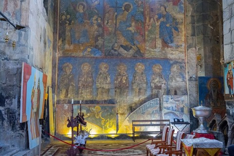 Church interior with rows of frescoes and abstract representations on the walls, Akhtala monastery,