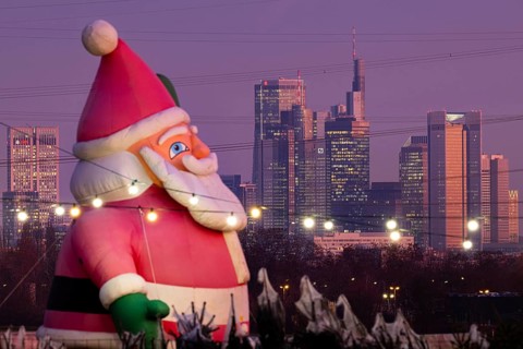 In a Christmas tree center near Frankfurt am Main, a multi-metre-high inflated figure of Santa