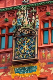 Exterior view of the magnificent clock at the Red Town Hall, Market Square, Basel
