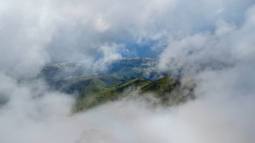 Fog clears, view of the valley from Pico Ruivo, hiking trail PR 1, 2, Madeira, Portugal