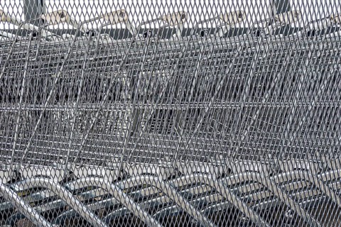 Close-up of several unused shopping carts, economic crisis, consumption