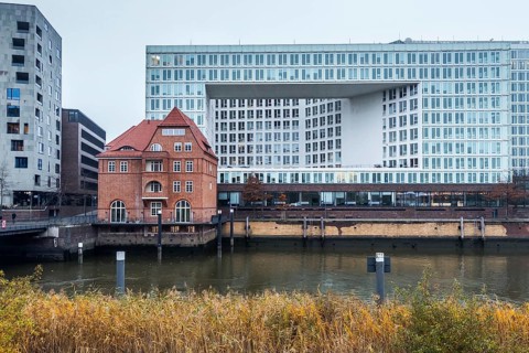Old customs house with mirror house, HafenCity, Hamburg, Germany