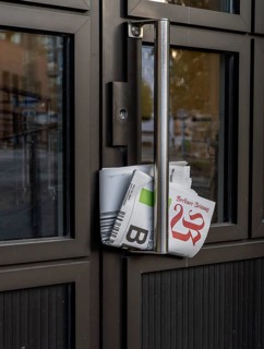Traditional delivery of a daily newspaper, Berlin, Germany