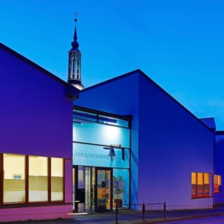 The Johanniszentrum with the top of St. John's Church in the evening, Witten, Ruhr area, Germany