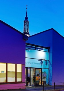 The Johanniszentrum with the top of St. John's Church in the evening, Witten, Ruhr area, Germany