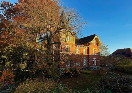 Villa-like house with garden in autumn, Lippstadt, North Rhine-Westphalia, Germany
