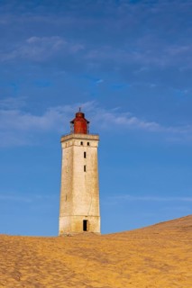 Rubjerg Knude Fyr / Rubjerg Knude lighthouse in the sand dunes on the top of Lønstrup Klint,