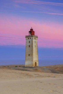 Rubjerg Knude Fyr / Rubjerg Knude lighthouse in the sand dunes on the top of Lønstrup Klint at