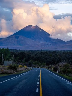 Roadshot, Mount Ngauruhoe evening at sunset, road SH 47. Tongariro National Park, North Island, New
