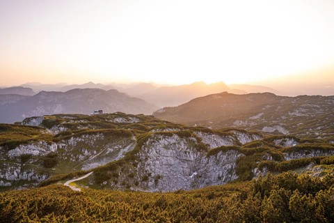 At the Berchtesgaden High Throne in summer at sunset, view of the Störhaus on Untersberg.