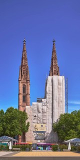 St. Boniface Catholic Church, scaffolding, renovation, trees, blue sky, cirrus clouds, Luisenplatz,
