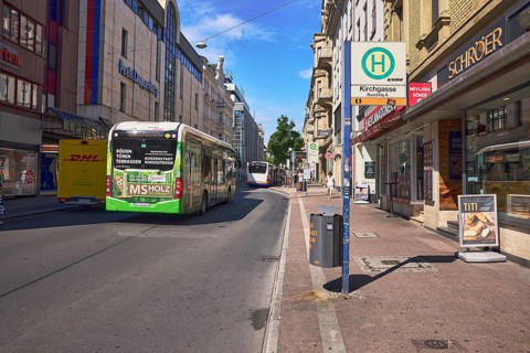 Kirchgasse bus platform A, public trash can, general architecture, residential and commercial