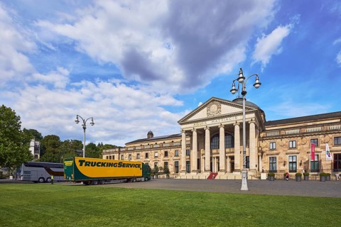 Spa hotel, neo-classical style, architect Friedrich von Thiersch, columns, lantern, trees, lawn,
