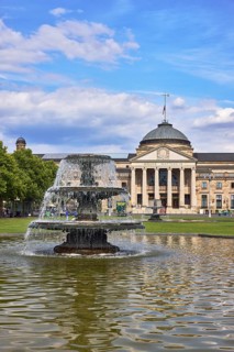 Spa hotel, neo-classical style, architect Friedrich von Thiersch, columns, gardens, trees, lawn,