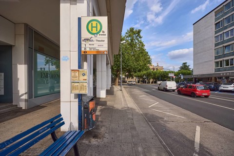 Spa hotel Theater bus stop, public transport, bench, zigzag line road marking, vehicles, general