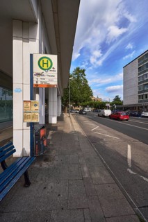 Spa hotel Theater bus stop, public transport, bench, zigzag line road marking, vehicles, general
