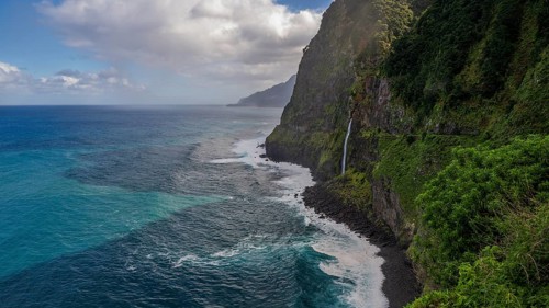 Waterfall flows into the sea, Miradouro do Véu da Noiva, Madeira, Portugal