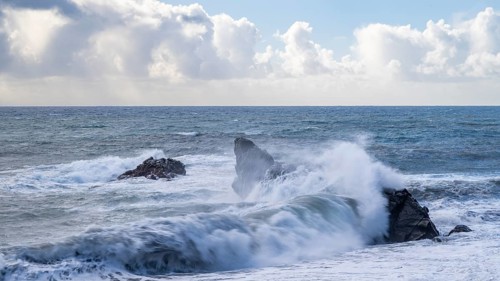 Waves hit rocks in the sea, Madeira, Portugal