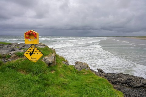 Lifebuoy and warning at Fairy Bridges, Bundoran, County Donegal, Ireland