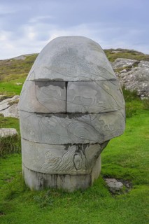 Stone monument with animal representations on the way to the Slieve League cliffs, West Donegal,