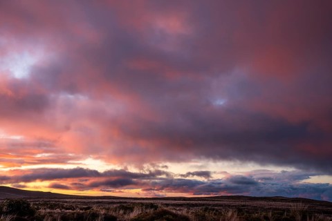 Cloudy sky at sunset, Tama Lake Walk (Tama Lakes Track) . Tongariro National Park, North Island,