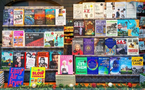 Books in window display of Waterstones bookshop, Ipswich, Suffolk, England, UK