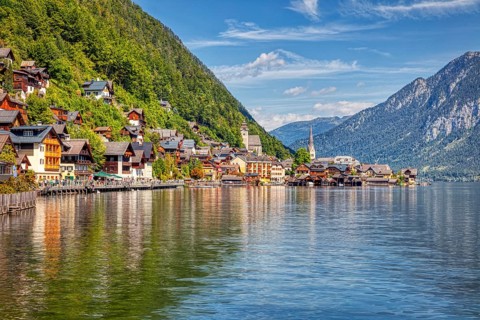 A, Hallstatt, hdr, A picturesque lakeside village with colorful houses against a mountain backdrop