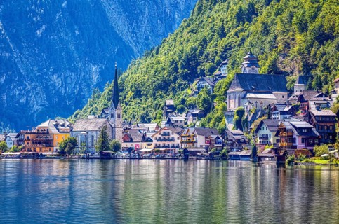 A, Hallstatt, hdr, A picturesque lakeside village with colorful views and steep mountain faces,