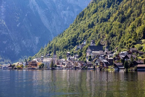 A, Hallstatt, A picturesque lakeside mountain village surrounded by steep, wooded slopes, Austria