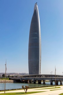 Tall skyscraper against clear sky, modern architectural design, Mohammed VI Tower in Rabat in