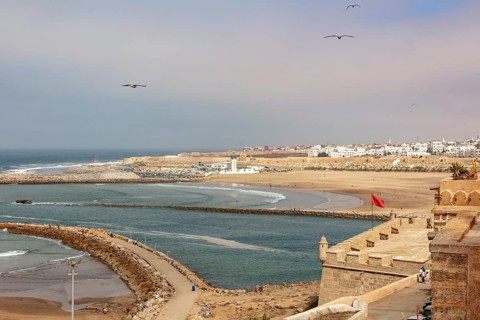Coastal panorama with views of city, sea and fortified walls